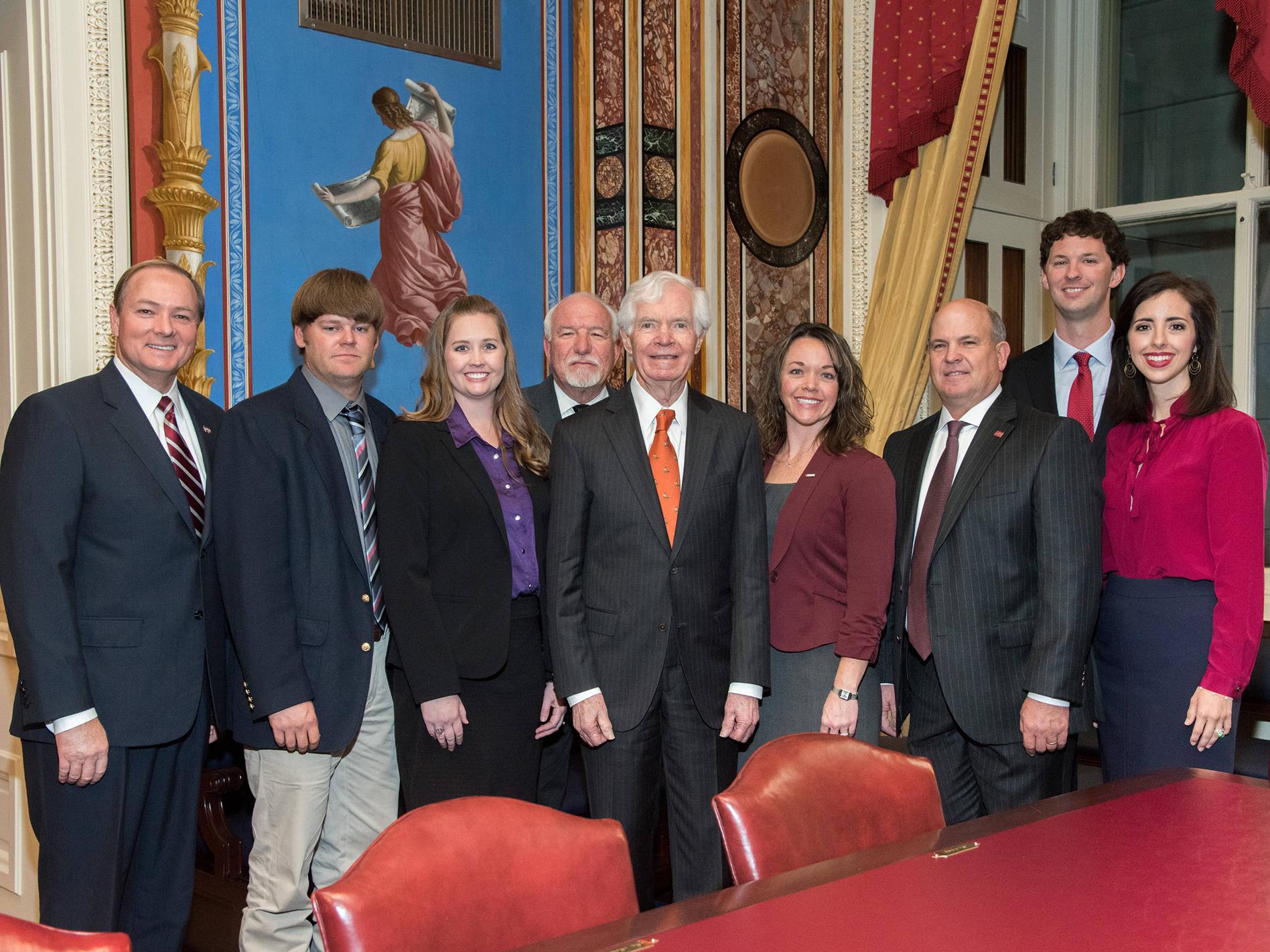 U.S. Sen. Thad Cochran, center, celebrates the establishment of the Thad Cochran Agricultural Leadership Program, a collaboration between the Mississippi State University Extension Service and Mississippi Farm Bureau. Joining him are, from left: MSU President Mark Keenum, Farm Bureau Young Farmer Committee members Jay and Kim Jayroe, MSU Division of Agriculture, Forestry and Veterinary Medicine Associate Vice President Bill Herndon, Sen. Cochran, MSU assistant Extension professor and program director Laura 