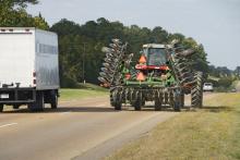 Farm machinery is seen year-round on Mississippi roads, but especially in the fall as farmers move equipment to different fields. (Photo by Marco Nicovich)