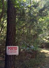 Signs posted on property help make everyone aware of property boundaries and often prevent trespass problems. (Photo by MSU Extension Service/Daryl Jones)