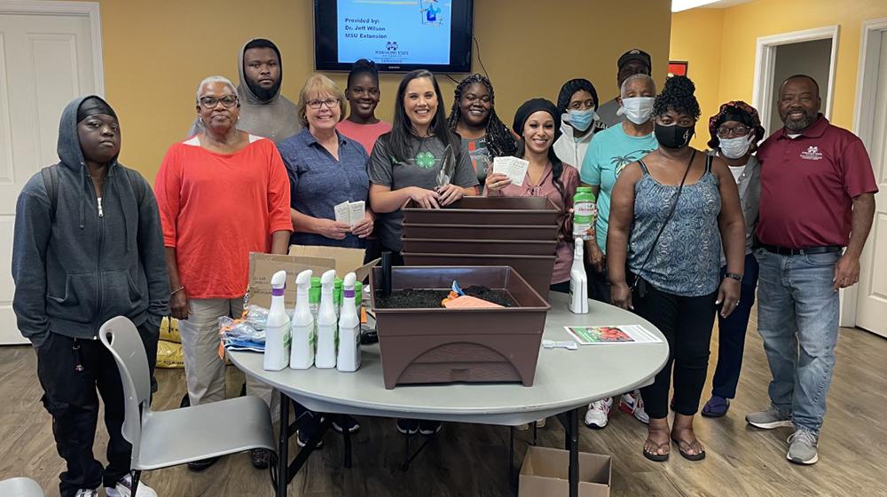 Container gardening presentation with residents at Spring Garden Apartment Complex.