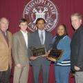 The Mississippi Agricultural and Forestry Experiment Station and the Mississippi State University Extension Service have presented 2006 Outstanding Worker Awards to K. Raja Reddy and Grenell Rogers. Reddy, center, is a research professor in the Department of Plant and Soil Sciences and Rogers, second from right, is an area Extension agent in Oktibbeha County. Presenting the awards were MSU Vice President for Agriculture, Forestry and Veterinary Medicine Vance Watson, left, Land Bank of North Mississippi Loa