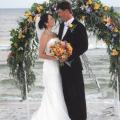 Maci and Graham Flautt, who now reside in Sumner, Miss., chose a beach location for their Sept. 5, 2004, wedding in Gulf Shores, Ala. This wedding destination offered the couple all the special details of a traditional wedding, but in an untraditional setting. (Photo used with permission)