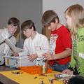 Jonathan Rodgers of DeSoto County, from left, Nick Murphy of Carroll County, Austin "Bubba" Meriweather of Leflore County and Kenzie Ellenberger of DeSoto County follow instructions to build a robot. The four joined other 4-H youth, volunteer leaders and agents at the recent kick-off of the 2012 robotics project at Mississippi State University. (Submitted Photo)