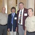 Rep. Scott Bounds, from left, Jerry Belant and Bruce Leopold of the Mississippi State University Center for Human-Wildlife Conflicts, and Sen. Giles Ward took part in the Mississippi Legislative Wild Hog Summit on Sept. 9, 2013, in Jackson, Miss. (Photo by MSU Ag Communications/Linda Breazeale)