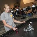 Renee Anderson, a member of a DeSoto County 4-H robotics club, prepares to test her robot's ability to chase an infrared ball, a task she programmed it to do. She took part in a five-day 4-H Robotics Academy hosted by the Mississippi State University Extension Service's Center for Technology Outreach. (Photo by MSU Ag Communications/Scott Corey)