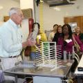 Frank Davis, founder and coordinator of the Insect Rearing Workshop at Mississippi State University, leads a tour of the USDA Agricultural Research Service lab Nov. 5, 2013. The 16th annual Insect Rearing Workshop featured sessions on raising insects for protein. (Photo by MSU Ag Communications/Kat Lawrence)