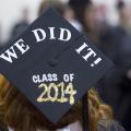 A graduate celebrates at the Mississippi State University spring commencement ceremony in May at the Humphrey Coliseum in Starkville, Miss. (Photo by MSU Office of Public Affairs/ Russ Houston)