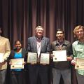 Mike Phillips, center, head of the Mississippi State University Department of Plant and Soil Sciences, joins faculty members and students from his department displaying awards received during a recent meeting of the Southern Branch of the American Society of Agronomy. Pictured are (from left to right) Jesse Morrison, doctoral student; Chathurika Wijewardana, master's student; Phillips (holding awards for Normie Buehring and Christian Baldwin); Firas Alsajri, doctoral student; and Ethan Norvell, undergraduat