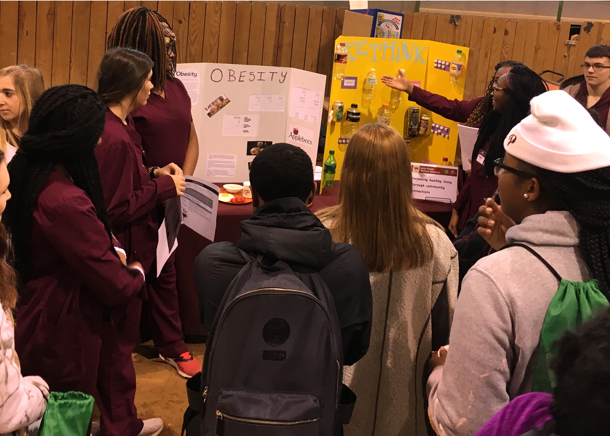 Jr Master Wellness Volunteers and "germs" as they prepare to deliver a lesson on hand washing.